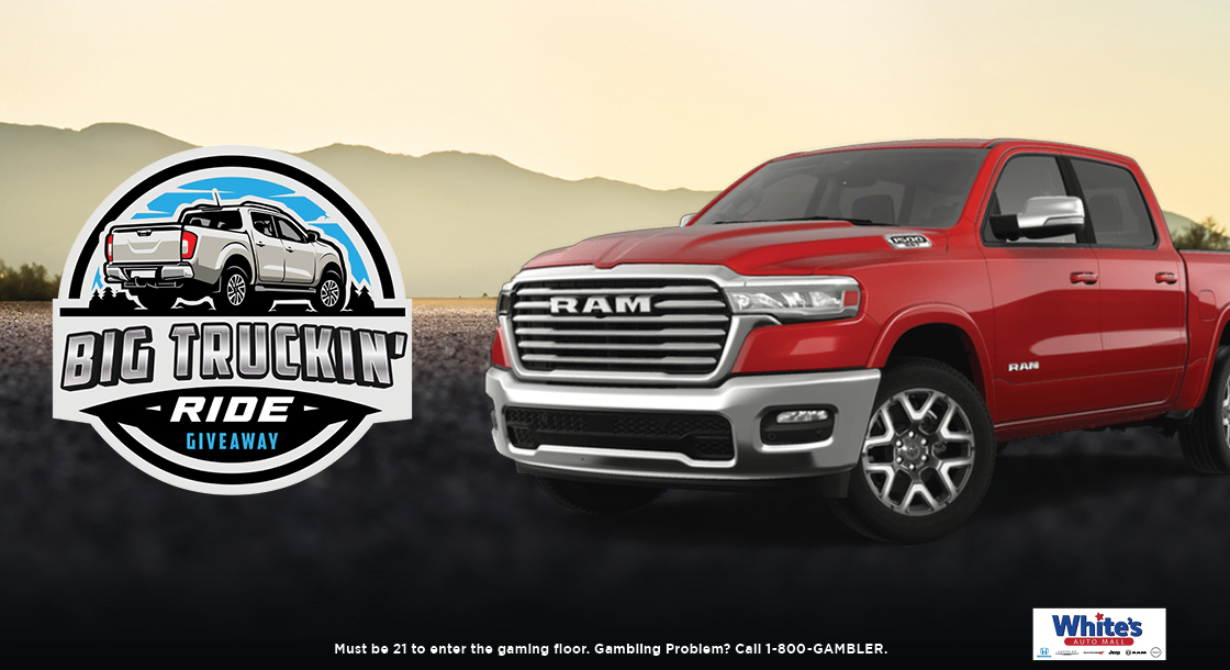 "Big Truckin' Ride" Logo next to a red RAM Laramie in front of mountains